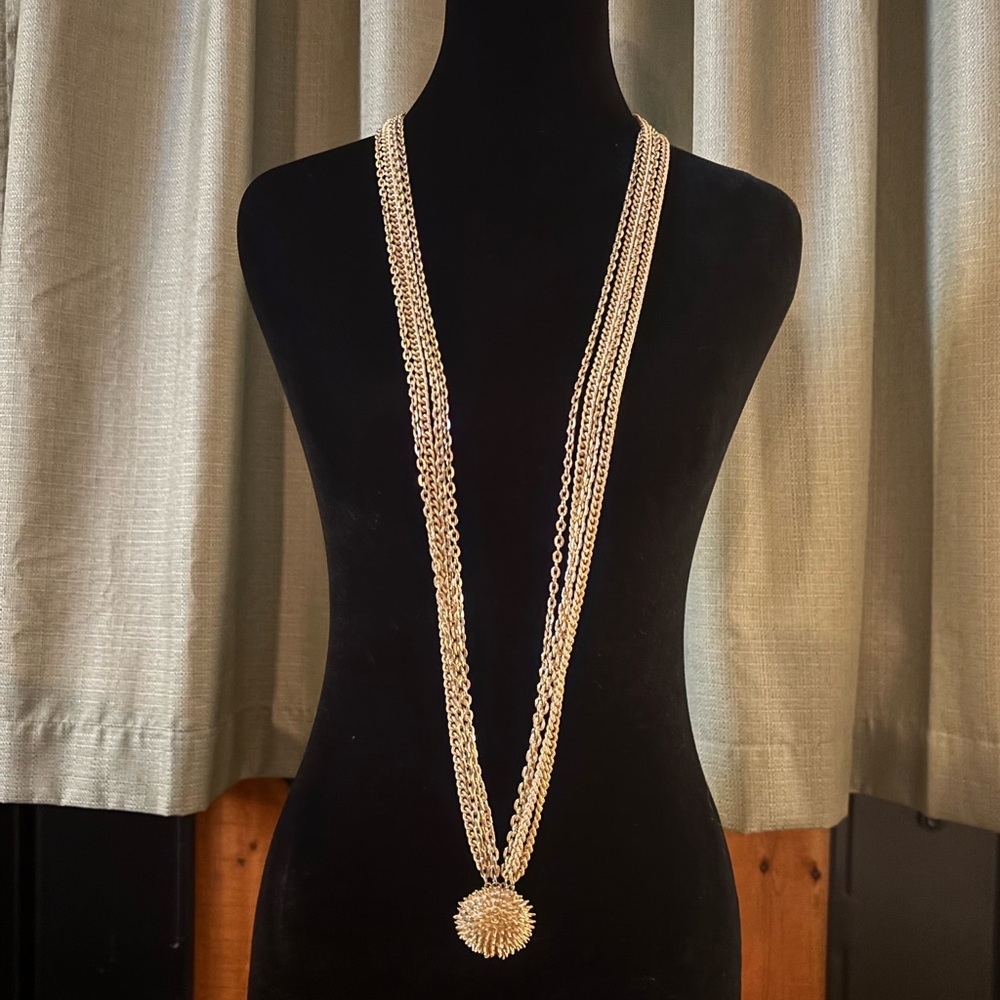 Gold tone multi strand 25” vintage with pendant